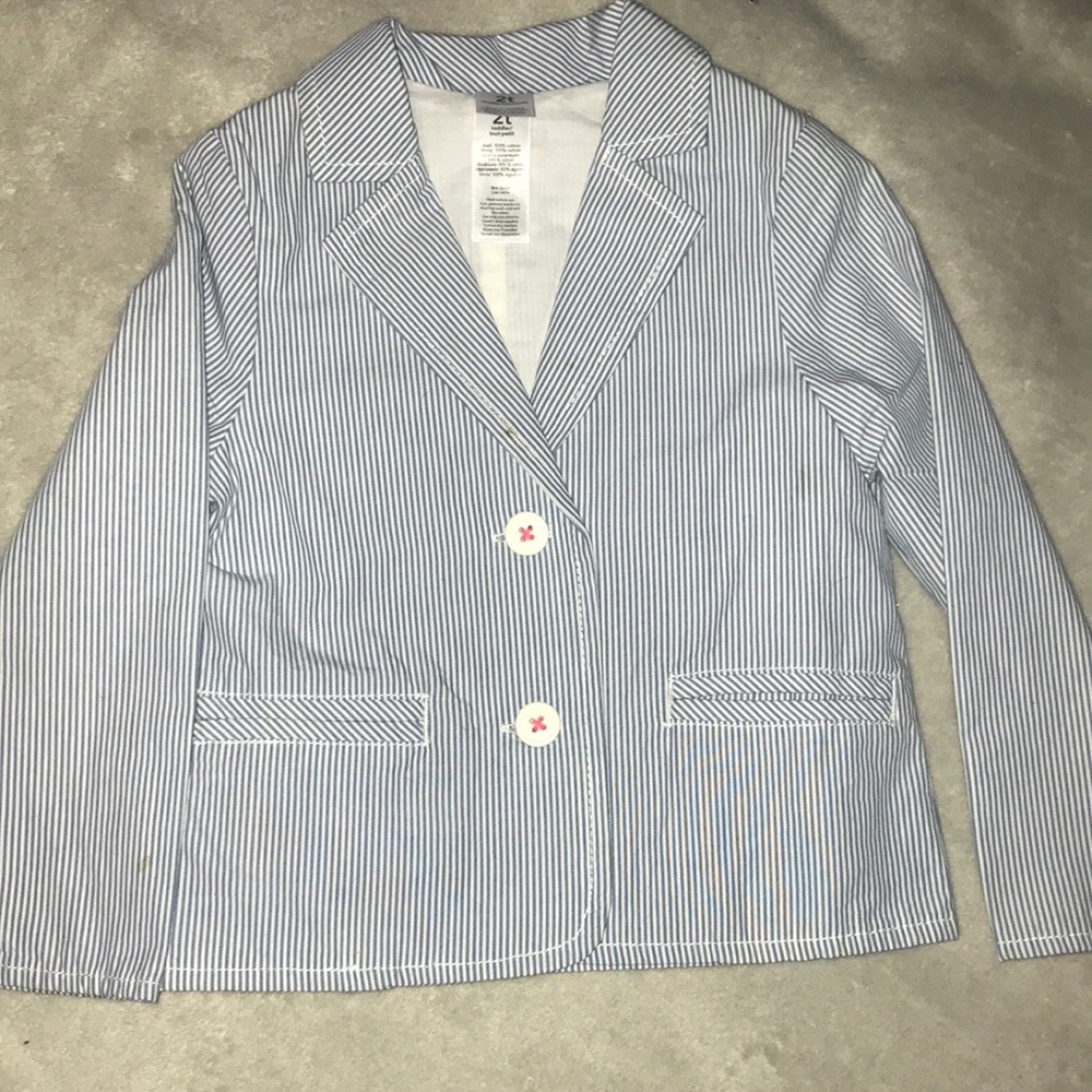 striped blue and white vest